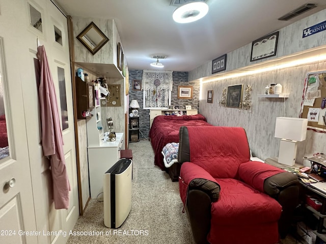 bedroom with light colored carpet