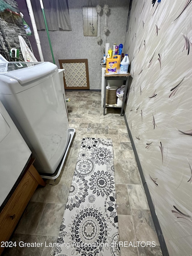 laundry room featuring separate washer and dryer