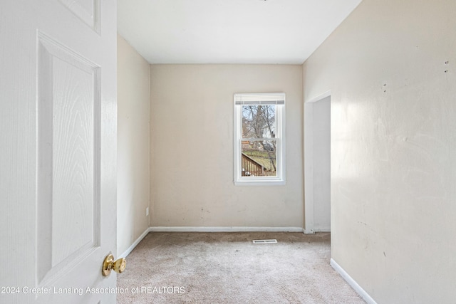 view of carpeted spare room