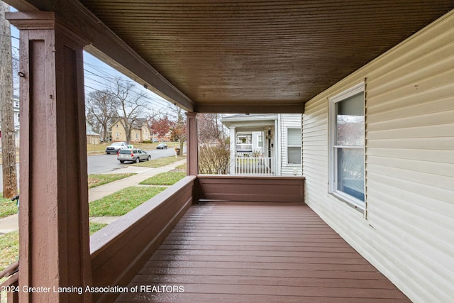 wooden terrace with covered porch