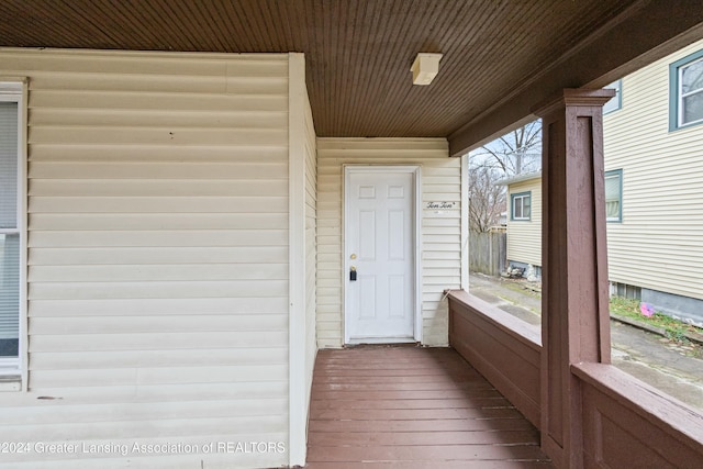 unfurnished sunroom featuring wood ceiling