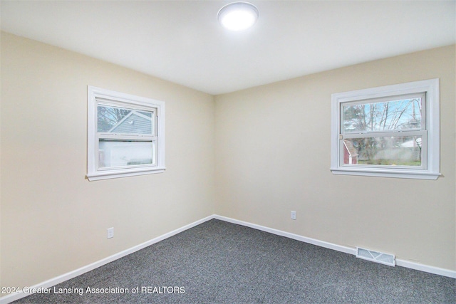 view of carpeted spare room