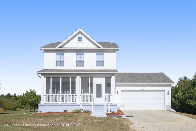 view of front of property with a garage