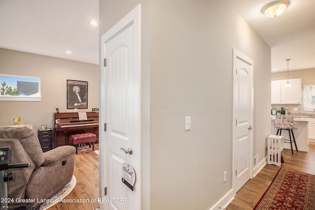 hall featuring light hardwood / wood-style flooring