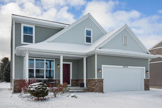 craftsman inspired home with a garage