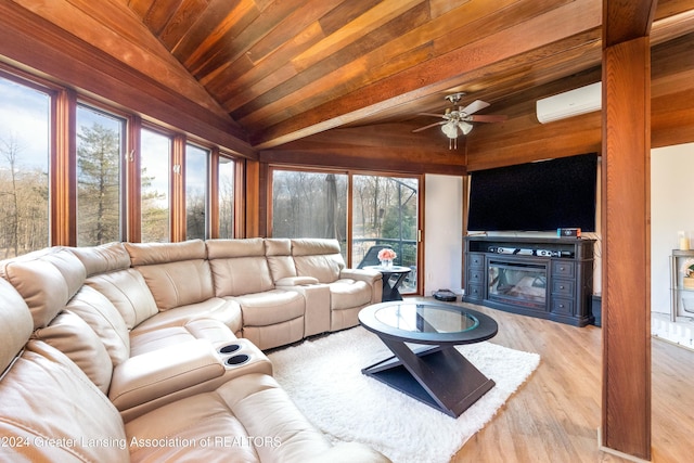 living room featuring wood ceiling, a wall unit AC, a fireplace, light hardwood / wood-style floors, and lofted ceiling