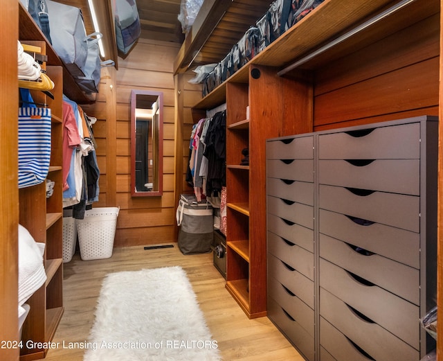 spacious closet with light wood-type flooring