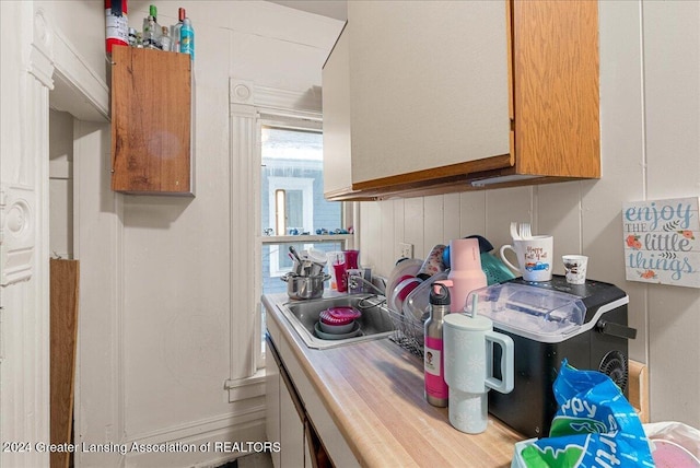 kitchen with sink and white cabinets