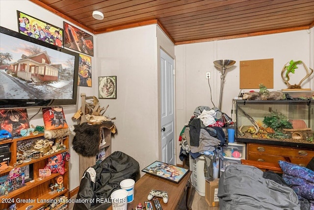 miscellaneous room featuring wood ceiling and ornamental molding