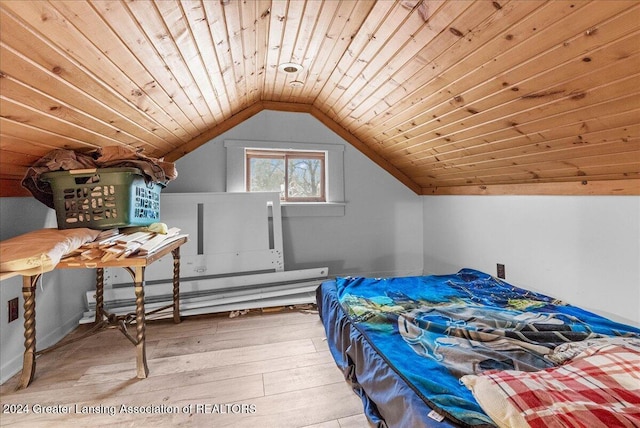 bedroom featuring lofted ceiling, light hardwood / wood-style floors, and wood ceiling