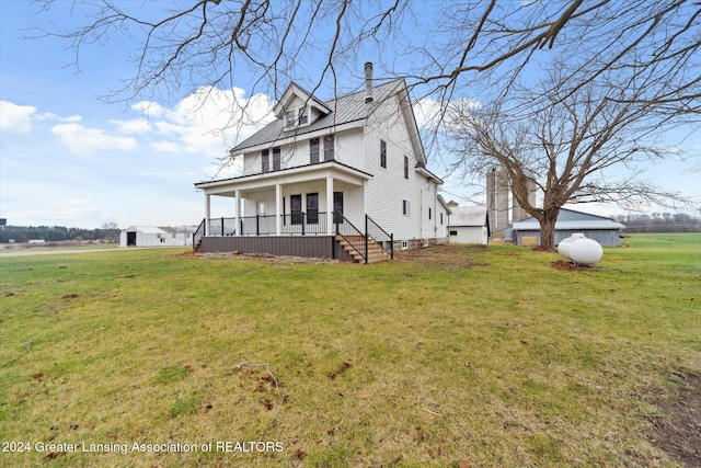 view of front of house featuring a porch and a front yard