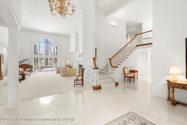 interior space featuring light tile patterned floors, crown molding, a high ceiling, and a chandelier