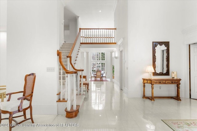 foyer with ornamental molding