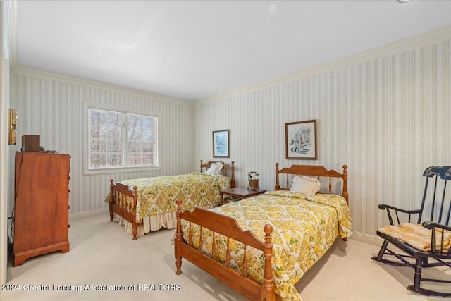 carpeted bedroom with ornamental molding