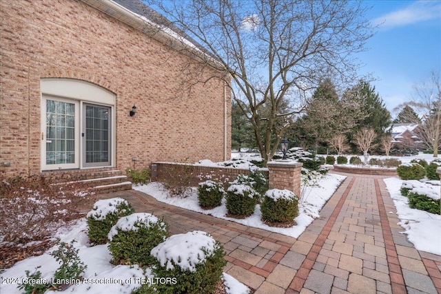 view of snow covered patio