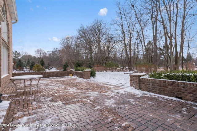 view of snow covered patio