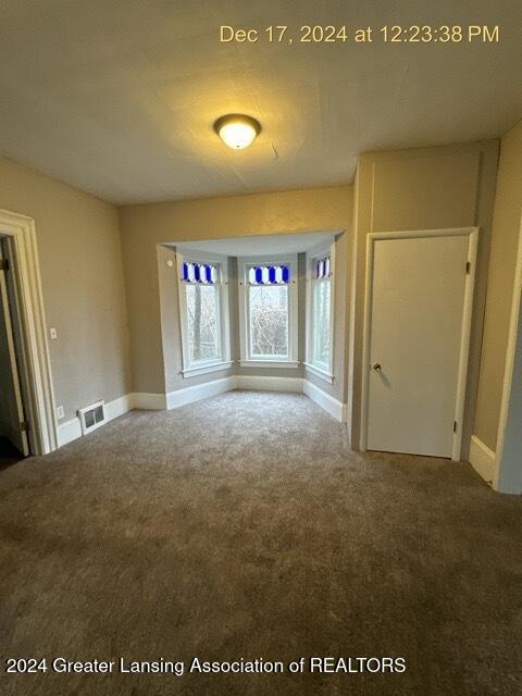 view of carpeted empty room