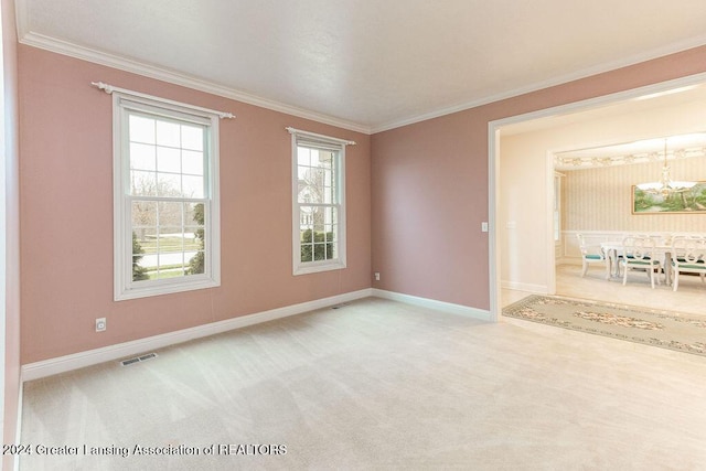 unfurnished room with carpet flooring and ornamental molding