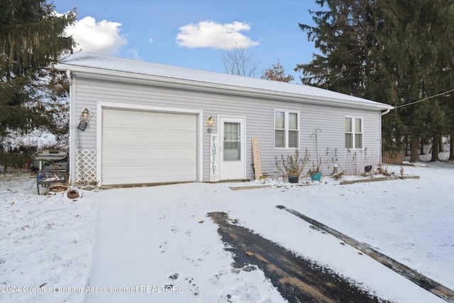 single story home with a garage