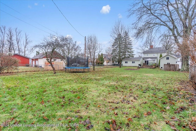 view of yard with a trampoline