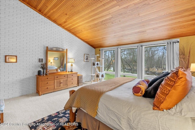 bedroom with carpet floors, wood ceiling, lofted ceiling, and brick wall