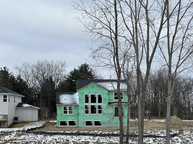 view of snow covered house