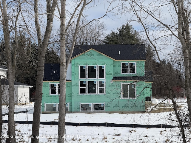 view of snow covered property