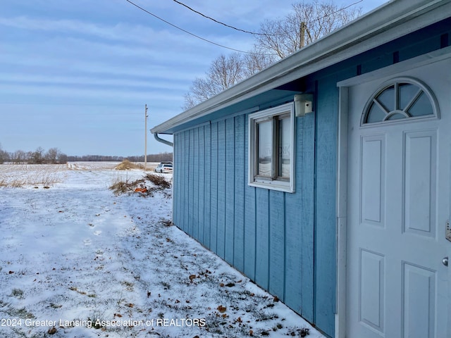 view of snow covered property