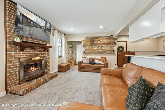 carpeted living room featuring a brick fireplace