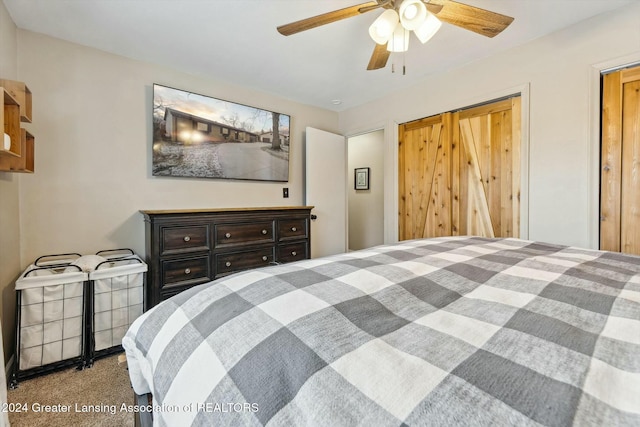 bedroom with ceiling fan, a closet, and carpet