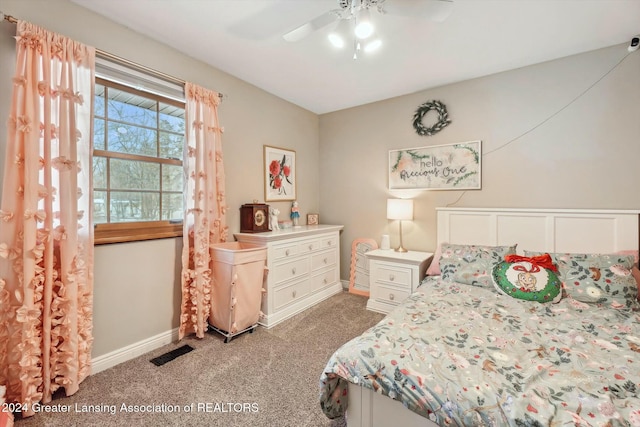 carpeted bedroom with ceiling fan