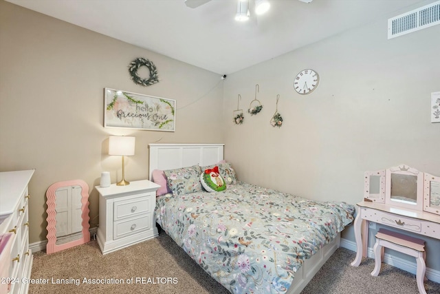 carpeted bedroom with ceiling fan