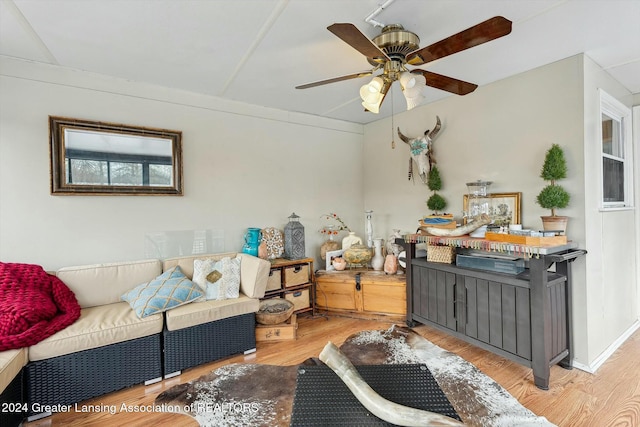 interior space featuring light hardwood / wood-style floors and ceiling fan