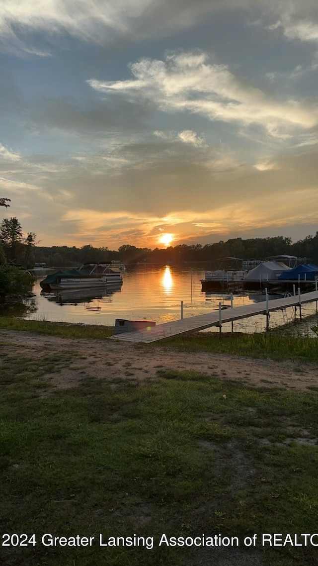 property view of water featuring a boat dock