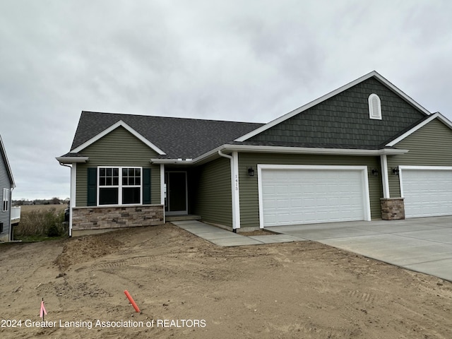 view of front of home with a garage