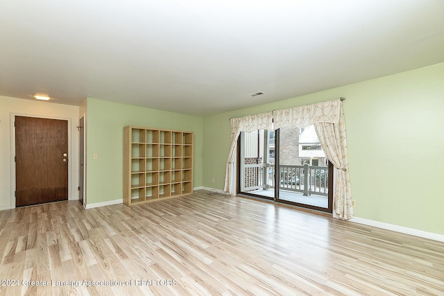 empty room featuring light hardwood / wood-style floors