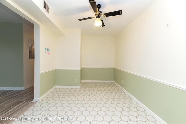 spare room with ceiling fan