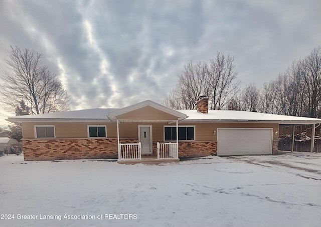 single story home with a carport and a garage