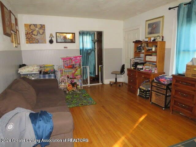 living room with hardwood / wood-style flooring