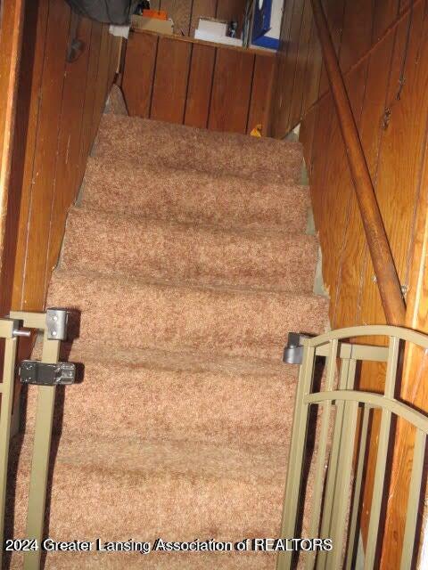 stairs with wooden walls