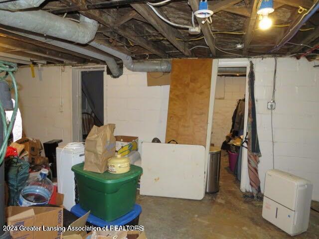 basement with fridge