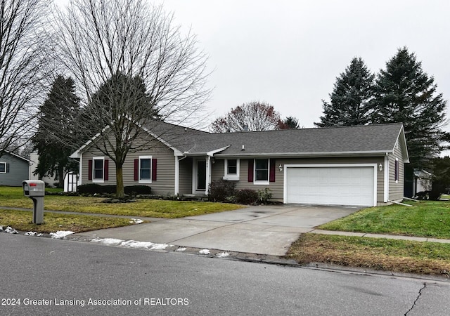 single story home featuring a front yard and a garage