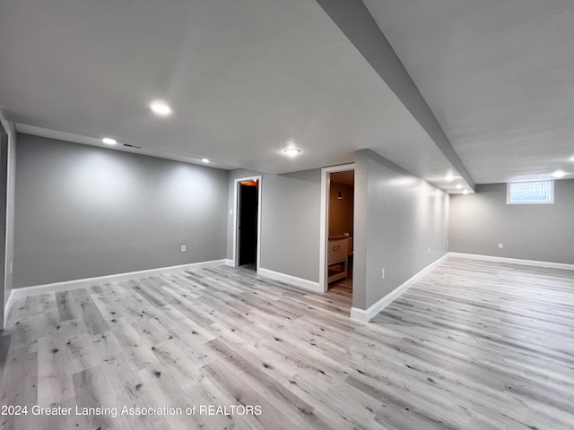 basement with light wood-type flooring