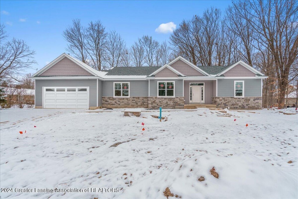 view of front of home with a garage