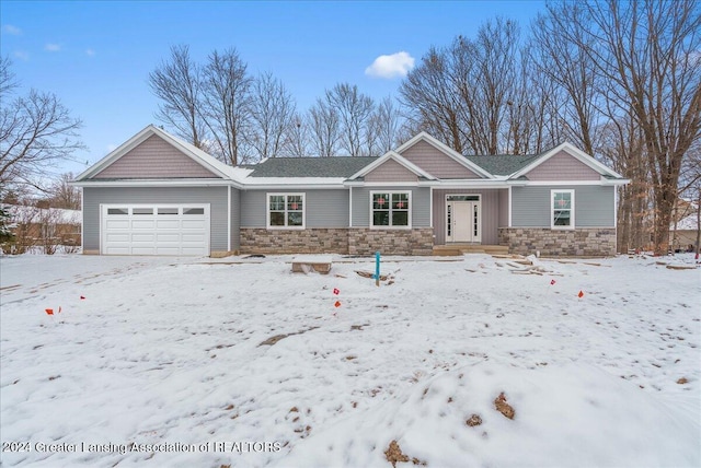 view of front of home with a garage