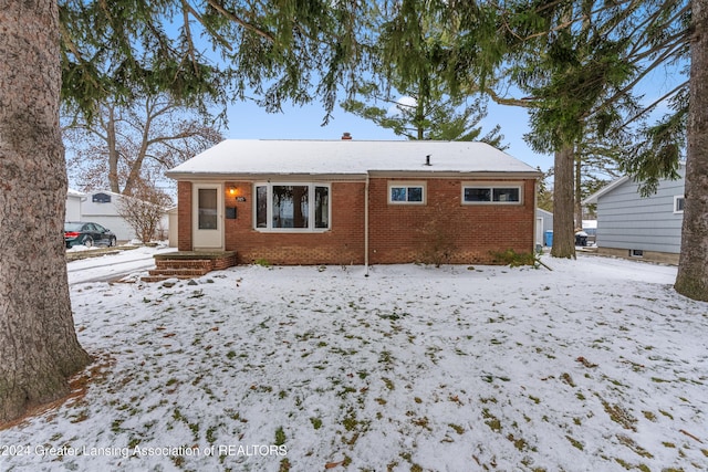 view of snow covered property