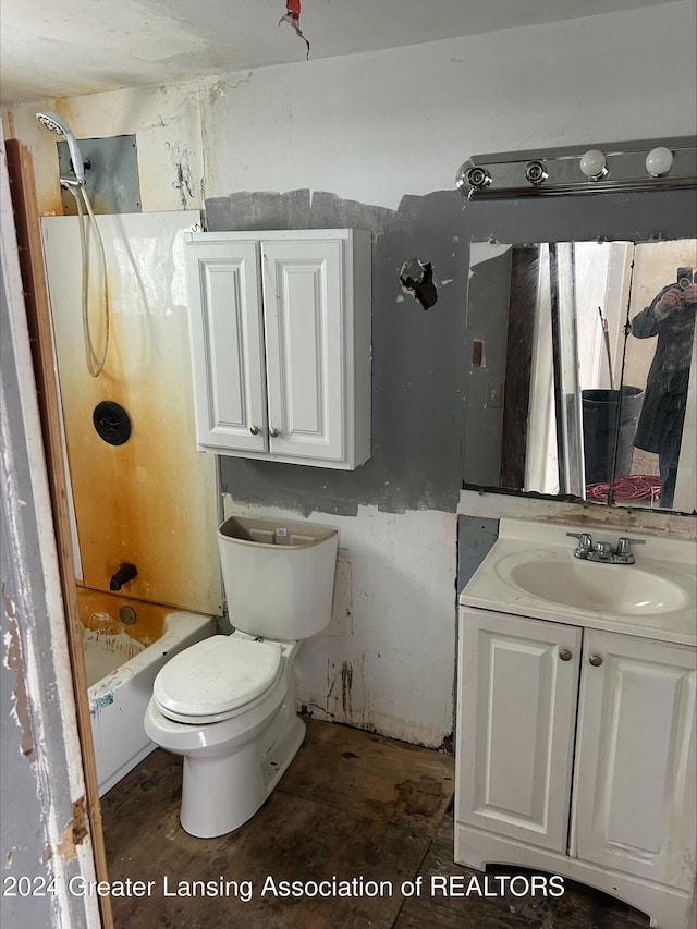 full bathroom with shower / washtub combination, vanity, and toilet