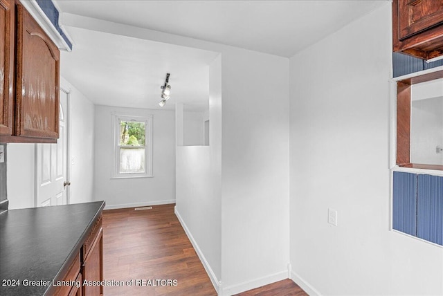 kitchen with dark hardwood / wood-style floors