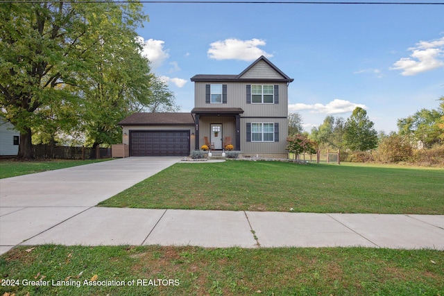 front facade with a garage and a front lawn