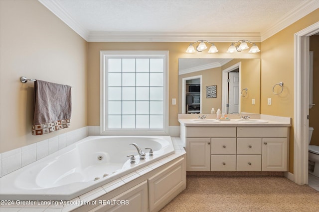 bathroom featuring vanity, a bath, crown molding, toilet, and a textured ceiling